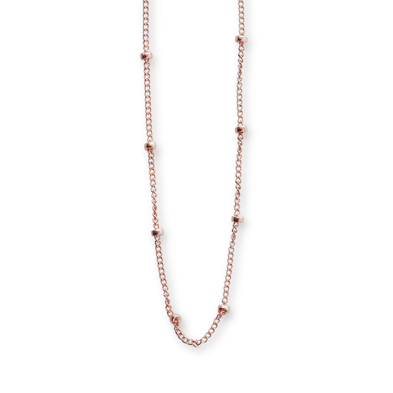 delicate rose gold beaded chain on transparent background