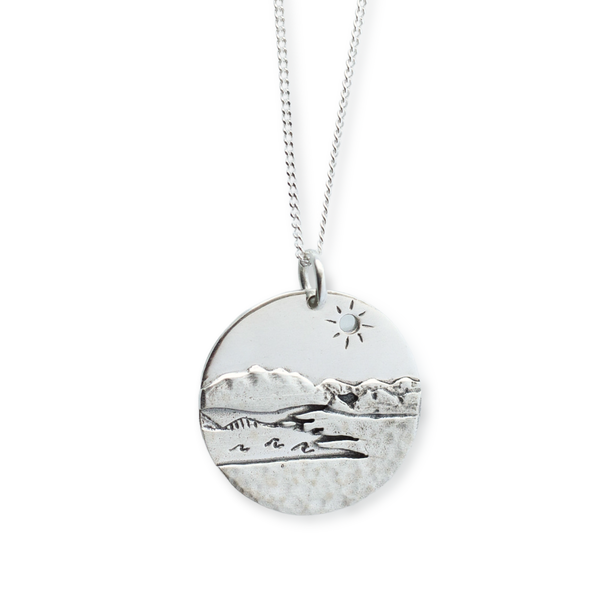Sterling silver Kelowna BC pendant with mountains, okanagan lake and the iconic bridge. 