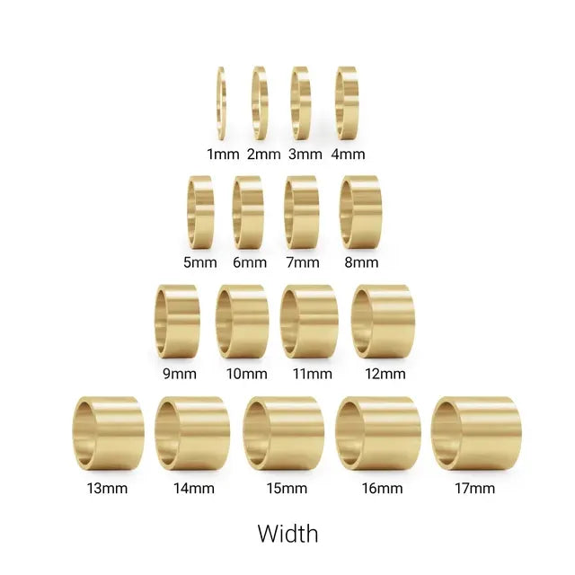Gold rings of various widths on a white background