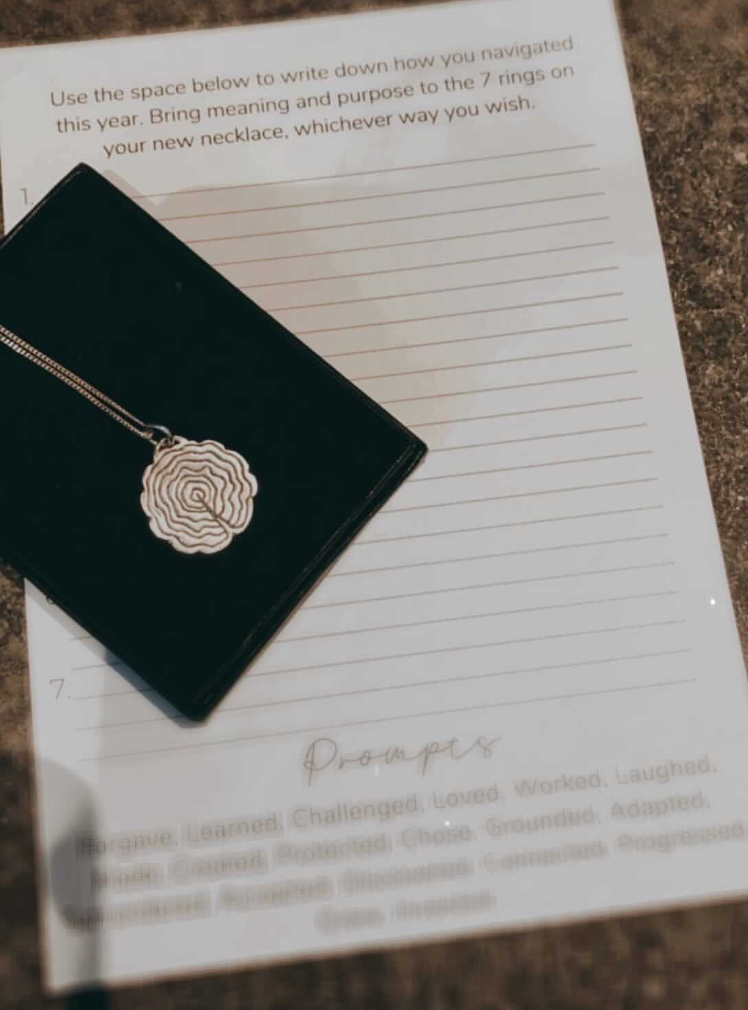 silver tree slice wooden stump necklace. Hand carved and handmade pendant in sterling silver