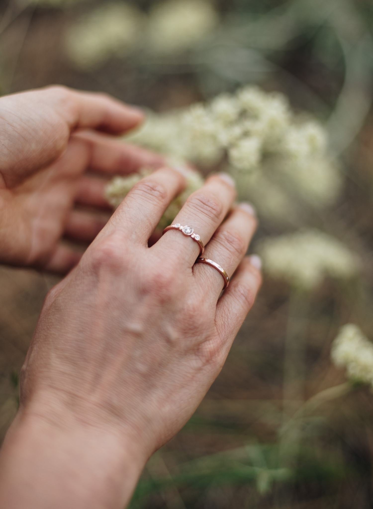 Rose gold moissanite and lab-grown diamond rings.