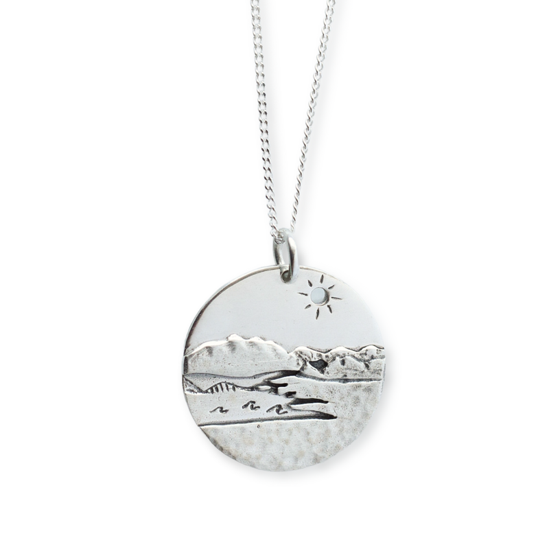 Sterling silver Kelowna BC pendant with mountains, okanagan lake and the iconic bridge. 