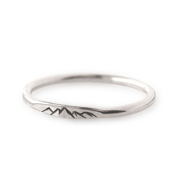 Silver dainty signet stacking ring with engraved mountain details.